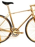 Goldgenie, maillot jaune et vélo en or